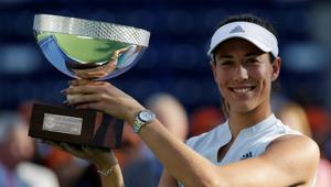 Spain's Garbine Muguruza celebrates winning the Monterrey Open with the trophy(REUTERS) Spain's Garbine Muguruza celebrates winning the Monterrey Open with the trophy(REUTERS)