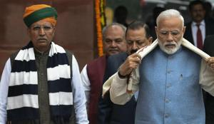 File photo of Prime Minister Narendra Modi along with minister of state Arjun Ram Meghwal on the first day of Budget Session of Parliament, in New Delhi, Thursday, Jan 31, 2019.(PTI File) File photo of Prime Minister Narendra Modi along with minister of state Arjun Ram Meghwal on the first day of Budget Session of Parliament, in New Delhi, Thursday, Jan 31, 2019.(PTI File)