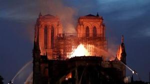 Fire fighters douse flames of the burning Notre Dame Cathedral in Paris, France April 15, 2019. REUTERS/Benoit Tessier(REUTERS) Fire fighters douse flames of the burning Notre Dame Cathedral in Paris, France April 15, 2019. REUTERS/Benoit Tessier(REUTERS)