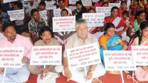 Members of the Sarna tribe in Jharkhand have been demanding a religious code so that they can have a separate identity. Presently, nature worshipping tribal families are termed as Hindus in the census register.(Diwakar Prasad/ HT File)