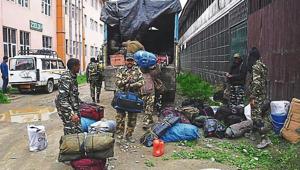 Security personnel arriving at a polling booth at a government higher secondary school in Srinagar on Tuesday.(ANI) Security personnel arriving at a polling booth at a government higher secondary school in Srinagar on Tuesday.(ANI)