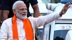 Prime Minister Narendra Modi during a road show in Bhubaneswar on Tuesday.(ANI Photo)