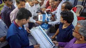 Prayagraj: Poll officials demonstrate the functioning of Electronic Voting Machines (EVM) and Voter Verified Paper Audit Trail (VVPAT) during a training programme for the Lok Sabha Elections 2019, in Prayagraj(Allahabad), Tuesday, April 16, 2019. (PTI Photo) (PTI4_16_2019_000064B)(PTI) Prayagraj: Poll officials demonstrate the functioning of Electronic Voting Machines (EVM) and Voter Verified Paper Audit Trail (VVPAT) during a training programme for the Lok Sabha Elections 2019, in Prayagraj(Allahabad), Tuesday, April 16, 2019. (PTI Photo) (PTI4_16_2019_000064B)(PTI)