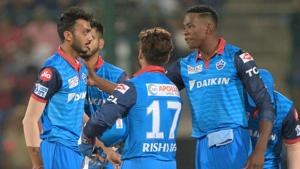 Delhi Capitals team players celebrates with teammates the dismissal of Mumbai Indians cricketer Ben Cutting.(AFP) Delhi Capitals team players celebrates with teammates the dismissal of Mumbai Indians cricketer Ben Cutting.(AFP)