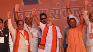Prime Minister Narendra Modi and UP CM Yogi Adityanath along with other BJP leaders at a rally in Etah on Saturday.(Raju Tomar/HT photo)