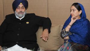 Union minister Harsimrat Kaur Badal with her husband and SAD president Sukhbir Singh Badal.(HT File)