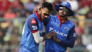 Delhi Capitals' Axar Patel, left, celebrates with captain Shreyas Iyer.(AP) Delhi Capitals' Axar Patel, left, celebrates with captain Shreyas Iyer.(AP)
