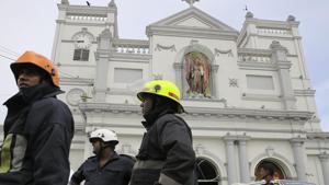 Sri Lankan firefighters stand in the area around St. Anthony's Shrine after a blast in Colombo, Sri Lanka(AP) Sri Lankan firefighters stand in the area around St. Anthony's Shrine after a blast in Colombo, Sri Lanka(AP)