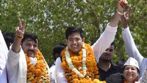 Aam Aadmi Party (AAP) candidate from South Delhi constituency Raghav Chadha along with party leader Sanjay Singh at a road show on Sunday, April 21, 2019.(Sanjeev Verma/HT PHOTO)