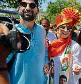 Often spotted in a colourful cotton kurta, Mohsin walks long distances at rallies across the constituency, as Urmila campaigns in an open vehicle(AFP)