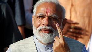 Prime Minister Narendra Modi shows his ink-marked finger after casting his vote outside a polling station during the third phase of general election in Ahmedabad, India, April 23, 2019.(REUTERS) Prime Minister Narendra Modi shows his ink-marked finger after casting his vote outside a polling station during the third phase of general election in Ahmedabad, India, April 23, 2019.(REUTERS)