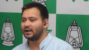 Tejashwi Prasad Yadav reacted sarcastically to photographs of Prime Minister Narendra Modi touching his mother’s feet.(/HT PHOTO)