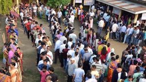 Voters stand in line at a polling station during the third phase of India's general election in Guwahati on Tuesday.(ANI photo) Voters stand in line at a polling station during the third phase of India's general election in Guwahati on Tuesday.(ANI photo)