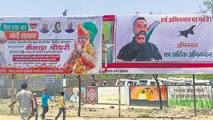 A poster of Wing Commander Abhinandan Varthaman put up before the rally of Prime Minister Narendra Modi in Barmer, Sunday April 21, 2019.(HT Photo) A poster of Wing Commander Abhinandan Varthaman put up before the rally of Prime Minister Narendra Modi in Barmer, Sunday April 21, 2019.(HT Photo)