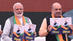 Modi finds mention at least 26 times and features prominently on the cover.(Arvind Yadav/HT PHOTO) Modi finds mention at least 26 times and features prominently on the cover.(Arvind Yadav/HT PHOTO)