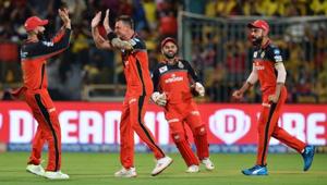 Royal Challengers Bangalore bowler Dale Steyn (2L) celebrates with his team mates and captain Virat Kohli (R) the dismissal of Chennai Super Kings batsman Shane Watson for 5 runs during the 2019 Indian Premier League (IPL) Twenty20 cricket match between Royal Challengers Bangalore and Chennai Super Kings at the M. Chinnaswamy Stadium in Bangalore on April 21, 2019.(AFP) Royal Challengers Bangalore bowler Dale Steyn (2L) celebrates with his team mates and captain Virat Kohli (R) the dismissal of Chennai Super Kings batsman Shane Watson for 5 runs during the 2019 Indian Premier League (IPL) Twenty20 cricket match between Royal Challengers Bangalore and Chennai Super Kings at the M. Chinnaswamy Stadium in Bangalore on April 21, 2019.(AFP)