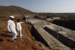 Mumbai, India - April 16, 2014: A dam being constructed to divert the flow of water from Par-Nar river to the nearby villages in Dindori, Maharashtra, India, on Wednesday, April 16, 2014. (Photo by Kalpak Pathak/ Hindustan Times)(Hindustan Times) Mumbai, India - April 16, 2014: A dam being constructed to divert the flow of water from Par-Nar river to the nearby villages in Dindori, Maharashtra, India, on Wednesday, April 16, 2014. (Photo by Kalpak Pathak/ Hindustan Times)(Hindustan Times)