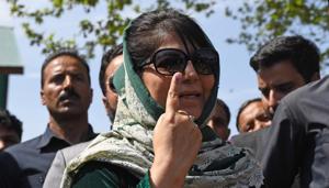 PDP President and Anantnag parliamentary seat candidate Mehbooba Mufti shows her marked finger after casting vote. Anantnag is voting in three rounds -- April 23, April 29 and May 6.(ANI file photo)