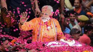 PM Narendra Modi gestures during a roadshow in Varanasi on April 25, 2019.(AFP photo)