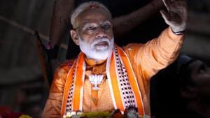 Prime minister Narendra Modi waves to his supporters during his roadshow for upcoming lok sabha elections campaign 2019 in Varanasi on Thursday.(ANI file photo) Prime minister Narendra Modi waves to his supporters during his roadshow for upcoming lok sabha elections campaign 2019 in Varanasi on Thursday.(ANI file photo)