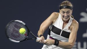 Petra Kvitova, of the Czech Republic, returns the ball to Ashleigh Barty, of Australia, during the Miami Open.(AP) Petra Kvitova, of the Czech Republic, returns the ball to Ashleigh Barty, of Australia, during the Miami Open.(AP)