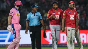 Rajasthan Royals' Jos Buttler (L) exchanges words with Kings XI Punjab's Ravichandran Ashwin (2ndR).(AFP) Rajasthan Royals' Jos Buttler (L) exchanges words with Kings XI Punjab's Ravichandran Ashwin (2ndR).(AFP)