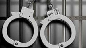 Two people, who were allegedly distributing cash to residents in Kamothe, asking them to vote for a candidates in Maval, were detained by the police on Saturday.