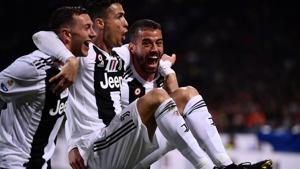 Juventus' Portuguese forward Cristiano Ronaldo (C) celebrates with his teammates after scoring a goal during the Italian Serie A football match between Inter Milan and Juventus on April 27, 2019 at the San Siro stadium in Milan(AFP) Juventus' Portuguese forward Cristiano Ronaldo (C) celebrates with his teammates after scoring a goal during the Italian Serie A football match between Inter Milan and Juventus on April 27, 2019 at the San Siro stadium in Milan(AFP)