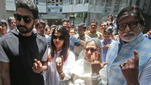Bollywood star Amitabh Bachchan, son Abhishek Bachchan, Aishwarya Rai Bachchan and Jaya Bachchan show ink marks on their fingers after casting their votes at a polling station in Mumbai.(REUTERS) Bollywood star Amitabh Bachchan, son Abhishek Bachchan, Aishwarya Rai Bachchan and Jaya Bachchan show ink marks on their fingers after casting their votes at a polling station in Mumbai.(REUTERS)