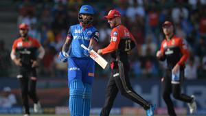 Royal Challengers Bangalore team players celebrate the dismissal of Delhi Capitals cricketer Shikhar Dhawan (C) during the 2019 Indian Premier League (IPL) Twenty20 cricket match between Delhi Capitals and Royal Challengers Bangalore(AFP) Royal Challengers Bangalore team players celebrate the dismissal of Delhi Capitals cricketer Shikhar Dhawan (C) during the 2019 Indian Premier League (IPL) Twenty20 cricket match between Delhi Capitals and Royal Challengers Bangalore(AFP)