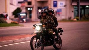 Soldiers on a motorbike patrol in Colombo on April 28, 2019, a week after a series of bomb blasts targeting churches and luxury hotels on Easter Sunday in Sri Lanka.(AFP photo)