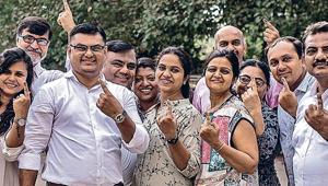 A family from Bhandup poses after exercising their franchise on Monday.(HT Photo) A family from Bhandup poses after exercising their franchise on Monday.(HT Photo)
