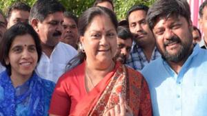 Former Rajasthan chief minister Vasundhara Raje with son and MP candidate Dushyant Singh and his wife after casting their vote, in Jhalawar, Rajasthan, on Monday, April 29.(HT Photo)
