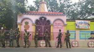 Central forces deployed outside a temple near Jagaddal police station in West Bengal.(HT PHOTO) Central forces deployed outside a temple near Jagaddal police station in West Bengal.(HT PHOTO)