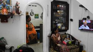 Sri Lankan Christians watch a live broadcast of a service conducted at their house near St. Anthony's Shrine in Colombo on May 5, 2019, two week after a series of bomb blasts targeting churches and luxury hotels on Easter Sunday in Sri Lanka.(AFP photo) Sri Lankan Christians watch a live broadcast of a service conducted at their house near St. Anthony's Shrine in Colombo on May 5, 2019, two week after a series of bomb blasts targeting churches and luxury hotels on Easter Sunday in Sri Lanka.(AFP photo)