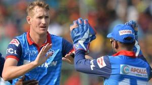 Delhi Capitals bowler Chris Morris (C) celebrates with teammates the dismissal of Royal Challengers Bangalore batsmen Parthiv Patel during the 2019 Indian Premier League (IPL) Twenty20 cricket match between Royal Challengers Bangalore and Delhi Capitals at the M. Chinnaswamy Stadium in Bangalore on April 7, 2019.(AFP) Delhi Capitals bowler Chris Morris (C) celebrates with teammates the dismissal of Royal Challengers Bangalore batsmen Parthiv Patel during the 2019 Indian Premier League (IPL) Twenty20 cricket match between Royal Challengers Bangalore and Delhi Capitals at the M. Chinnaswamy Stadium in Bangalore on April 7, 2019.(AFP)
