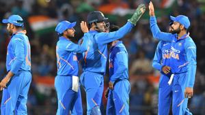 A file photo of Indian cricket team captain Virat Kohli (R) celebrating with MS Dhoni (C).(AFP) A file photo of Indian cricket team captain Virat Kohli (R) celebrating with MS Dhoni (C).(AFP)