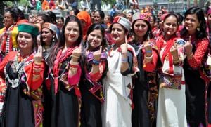 Women wearing traditional dresses during voting awareness programme in Kullu.(ANI file photo)