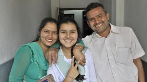 Ritika, a student of BCM Senior Secondary School, Focal Point, celebrating her success with her parents, after Class 10th results of Punjab School Education Board (PSEB) were out in Ludhiana (Photo by Gurminder Singh/Hindustan Times) Ritika, a student of BCM Senior Secondary School, Focal Point, celebrating her success with her parents, after Class 10th results of Punjab School Education Board (PSEB) were out in Ludhiana (Photo by Gurminder Singh/Hindustan Times)