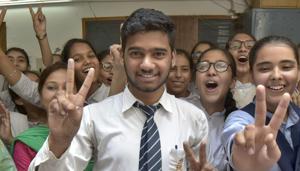 Neeraj Yadev scored 100 percent in sports category student from Teja Singh Sutantar School in jubilant mood after PSEB result declared in school premises, in Ludhiana (Photo by Gurpreet Singh/Hindustan Times) Neeraj Yadev scored 100 percent in sports category student from Teja Singh Sutantar School in jubilant mood after PSEB result declared in school premises, in Ludhiana (Photo by Gurpreet Singh/Hindustan Times)