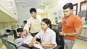 Nishant Tikekar, head, health teach, SCEI (left) working with his team at the Symbiosis Centre for Entrepreneurship and Innovation (SCEI) Institute within the Lavale campus on Wednesday.(Pratham Gokhale/HT Photo) Nishant Tikekar, head, health teach, SCEI (left) working with his team at the Symbiosis Centre for Entrepreneurship and Innovation (SCEI) Institute within the Lavale campus on Wednesday.(Pratham Gokhale/HT Photo)