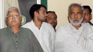 File photo of RJD chief Lalu Prasad with party leader Raghuvansh Prasad Singh. Singh is the party candidate from Vaishali LS seat in 2019 general elections.(PTI File) File photo of RJD chief Lalu Prasad with party leader Raghuvansh Prasad Singh. Singh is the party candidate from Vaishali LS seat in 2019 general elections.(PTI File)