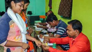 A first time voter gets indelible ink put on her finger after casting her vote in Madhya Pradesh.(PTI)