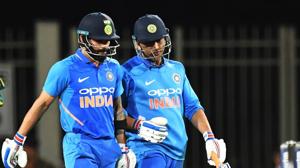 Indian captain Virat Kohli and MS Dhoni during an ODI.(AFP)