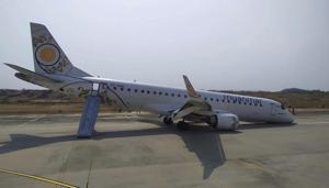 All passengers and crew are reported safe and uninjured after a Myanmar National Airlines plane made a scheduled but emergency landing at Mandalay International Airport on only its rear landing wheels after the front landing gear failed to deploy.(AP file photo) All passengers and crew are reported safe and uninjured after a Myanmar National Airlines plane made a scheduled but emergency landing at Mandalay International Airport on only its rear landing wheels after the front landing gear failed to deploy.(AP file photo)