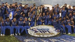 Mumbai Indians (MI) skipper Rohit Sharma with his teammates celebrating with Indian Premier League 2019 winning trophy.(AP) Mumbai Indians (MI) skipper Rohit Sharma with his teammates celebrating with Indian Premier League 2019 winning trophy.(AP)