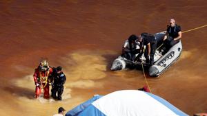 A diver gets out of Kokkinopezoula lake, also known as "red lake" after an investigation for possible bodies of victims of a suspected serial killer near the village of Mitsero, Cyprus on May 6, 2019.(Reuters Photo) A diver gets out of Kokkinopezoula lake, also known as "red lake" after an investigation for possible bodies of victims of a suspected serial killer near the village of Mitsero, Cyprus on May 6, 2019.(Reuters Photo)