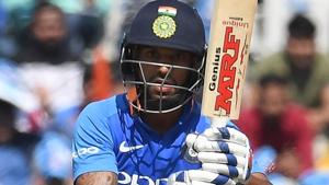 Shikhar Dhawan plays a shot during the fourth one-day international (ODI).(AFP)