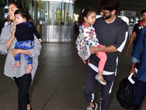 Mira Rajput and Shahid Kapoor with kids Misha and Zain at Mumbai airport.(Varinder Chawla) Mira Rajput and Shahid Kapoor with kids Misha and Zain at Mumbai airport.(Varinder Chawla)