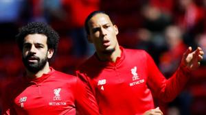 File image of Liverpool footballers Mohamed Salah and Virgil Van Dyk (R).(REUTERS) File image of Liverpool footballers Mohamed Salah and Virgil Van Dyk (R).(REUTERS)